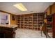Spacious basement features custom shelving, ideal for displaying collectibles or creating a hobby space at 104 Lumby Ln, Stockbridge, GA 30281