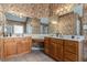 The bathroom features dual vanities, mirrors, and patterned wallpaper at 104 Lumby Ln, Stockbridge, GA 30281