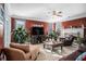 Cozy living room featuring tile floors, a fireplace, and lots of natural light at 104 Lumby Ln, Stockbridge, GA 30281