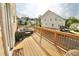 Inviting balcony features wood floors, patio furniture, and a view of the neighborhood at 166 Fender Walk, Marietta, GA 30060
