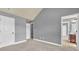 Bedroom with carpeted floors and access to a bathroom and closet at 2603 Dayview Ln, Atlanta, GA 30331