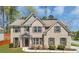Charming two-story brick home with manicured landscaping and inviting front entrance at 2603 Dayview Ln, Atlanta, GA 30331