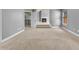 Carpeted living room features a fireplace and steps leading to another level at 2603 Dayview Ln, Atlanta, GA 30331