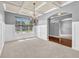 Spacious living room with coffered ceiling and large windows at 2603 Dayview Ln, Atlanta, GA 30331