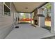 Covered patio boasts an outdoor fireplace and ample space for entertaining at 2603 Dayview Ln, Atlanta, GA 30331