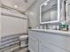 This is a lovely bathroom with a shower, toilet, sink and mirror with medicine cabinet at 305 Nobleman Way, Canton, GA 30114