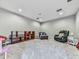 Large, carpeted bonus room with shelving, recessed lights, and ample space for activities at 305 Nobleman Way, Canton, GA 30114