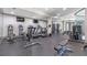 Bright fitness center featuring treadmills, weight machines, and other exercise equipment at 3621 Vinings Slope Se # 3204, Atlanta, GA 30339