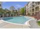 Beautiful outdoor swimming pool and lounge area for relaxing and enjoying sunny days at 3621 Vinings Slope Se # 3204, Atlanta, GA 30339