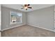 Bedroom featuring neutral walls, window and carpet at 3634 Lost Oak Dr, Buford, GA 30519