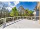 Relax on this large deck overlooking mature trees and beautiful landscaping at 3634 Lost Oak Dr, Buford, GA 30519