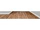Close up of the attractive wood-look flooring, white baseboards and gray walls at 3634 Lost Oak Dr, Buford, GA 30519