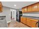 Kitchen with stainless steel appliances, shaker cabinets, granite counter tops and new flooring at 3634 Lost Oak Dr, Buford, GA 30519