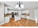 Modern kitchen featuring an island, stainless steel appliances, and white cabinetry for a bright, inviting space at 3634 Lost Oak Dr, Buford, GA 30519