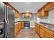 Spacious kitchen with stainless steel appliances, shaker cabinets and lots of storage at 3634 Lost Oak Dr, Buford, GA 30519