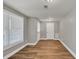 Bonus room with hardwood flooring, neutral walls and a large window letting in light at 3634 Lost Oak Drive, Buford, GA 30519