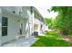Townhome backyard featuring a small patio and lawn, ideal for relaxation and low-maintenance living at 4277 Arcadia Dr, Decatur, GA 30034