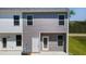Rear exterior of modern townhome, showing neutral siding and private outdoor space at 4277 Arcadia Dr, Decatur, GA 30034