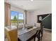 Spacious dining area featuring a large window and stylish decor, great for gatherings and everyday living at 4277 Arcadia Dr, Decatur, GA 30034