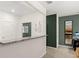 Welcoming entryway featuring a stylish design, granite counter, and a glimpse into the home's interior at 4277 Arcadia Dr, Decatur, GA 30034