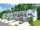 New townhomes featuring modern exteriors, well-maintained landscaping, and a welcoming community setting at 4277 Arcadia Dr, Decatur, GA 30034