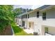 Row of townhomes with lush green landscaping at 4277 Arcadia Dr, Decatur, GA 30034