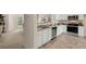 Well-lit kitchen with stainless appliances, ample counter space, and an open layout connecting to other living areas at 4277 Arcadia Dr, Decatur, GA 30034