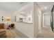 Open-concept living area with a view of the kitchen, perfect for entertaining and modern living at 4277 Arcadia Dr, Decatur, GA 30034