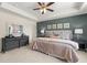 Spacious main bedroom features neutral decor, tray ceiling, and lots of natural light at 4277 Arcadia Dr, Decatur, GA 30034
