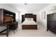 Bedroom featuring dark wood furnishings, complementary decor, and a calm setting at 540 Cambridge Way, Atlanta, GA 30328