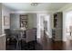 Inviting dining area with custom cabinets and a round table, perfect for wine tasting and casual dining at 540 Cambridge Way, Atlanta, GA 30328