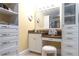 Dressing area with vanity, drawers, and custom lighting at 540 Cambridge Way, Atlanta, GA 30328