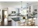 Charming kitchen with white cabinets, granite counters, stainless steel appliances, and hardwood floors at 540 Cambridge Way, Atlanta, GA 30328