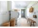 Convenient laundry room with storage, appliances, and a bench at 540 Cambridge Way, Atlanta, GA 30328