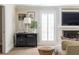 A comfortable living room featuring a cozy fireplace and built-in TV, ideal for Gathering time at 540 Cambridge Way, Atlanta, GA 30328