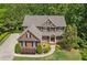 Aerial view showcasing the home's roof and landscaping at 150 Fitzroy Ln, Acworth, GA 30101