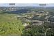 Aerial view of wooded neighborhood and home at 150 Fitzroy Ln, Acworth, GA 30101 at 150 Fitzroy Ln, Acworth, GA 30101