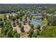 Aerial view of the community tennis and basketball courts, surrounded by lush trees and greenery at 150 Fitzroy Ln, Acworth, GA 30101
