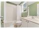 Bright bathroom featuring a shower over tub with white tiling and a sleek white vanity at 150 Fitzroy Ln, Acworth, GA 30101