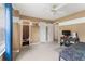 Bedroom features neutral colored walls, carpet, and a ceiling fan at 150 Fitzroy Ln, Acworth, GA 30101