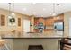 Open-concept kitchen featuring a large island, stainless steel appliances, and ample cabinetry at 150 Fitzroy Ln, Acworth, GA 30101