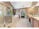 Spacious main bathroom suite with a large soaking tub, a glass shower and double sink vanity at 150 Fitzroy Ln, Acworth, GA 30101