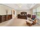 Large main bedroom with trey ceiling and a doorway to an ensuite bathroom at 150 Fitzroy Ln, Acworth, GA 30101