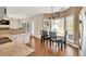 Open kitchen with breakfast nook showing lots of natural light at 210 Chandler Ct, Sugar Hill, GA 30518