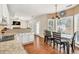 Spacious kitchen offers stainless appliances and natural light, adjoining breakfast area at 210 Chandler Ct, Sugar Hill, GA 30518