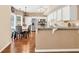 Open kitchen offers granite countertops, stainless steel appliances, and a breakfast nook at 210 Chandler Ct, Sugar Hill, GA 30518
