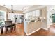View of open kitchen with stainless steel appliances, and breakfast nook at 210 Chandler Ct, Sugar Hill, GA 30518