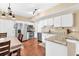 Charming kitchen with updated appliances and breakfast table with chairs at 210 Chandler Ct, Sugar Hill, GA 30518