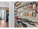 Well-organized pantry with wire shelving and a variety of food items and cooking supplies on display at 210 Chandler Ct, Sugar Hill, GA 30518