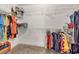 Spacious walk-in closet with shelving for optimal storage and organization of clothing and accessories at 210 Chandler Ct, Sugar Hill, GA 30518